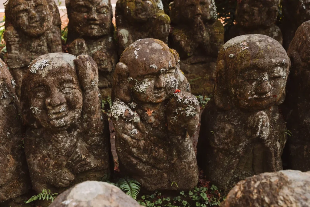 Rakan statues at Otagi Nenbutsuji Temple, one of the most curious sights in Kyoto.