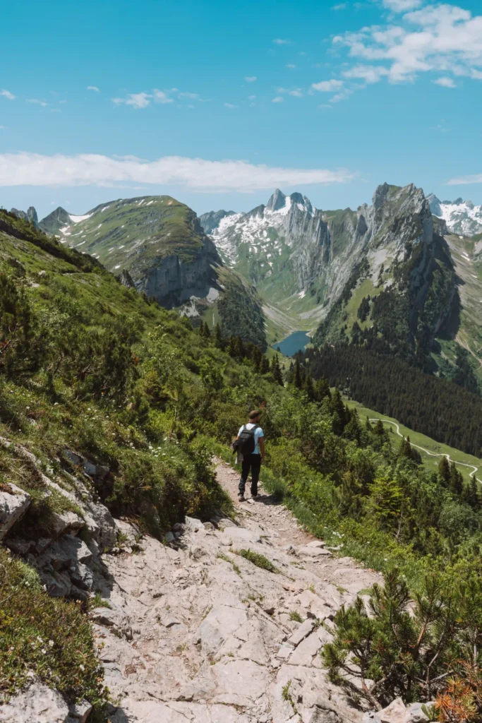 Lake Fälensee tucked between towering mountain walls