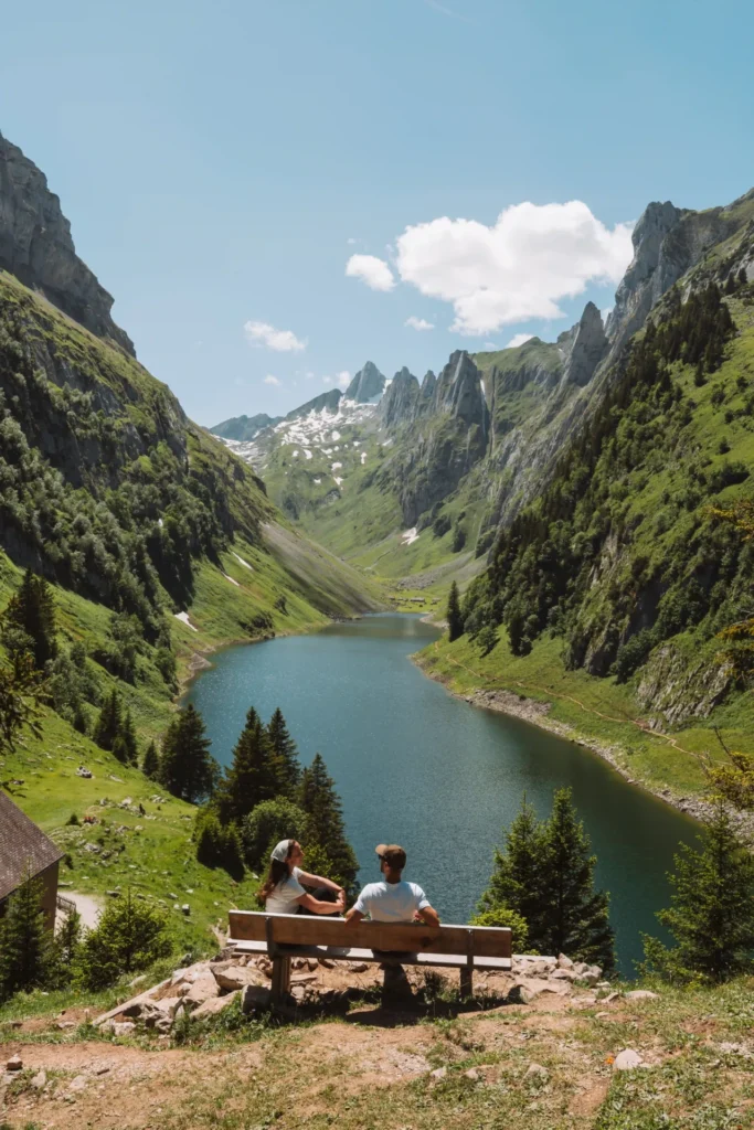 Lake Fälensee tucked between towering mountain walls