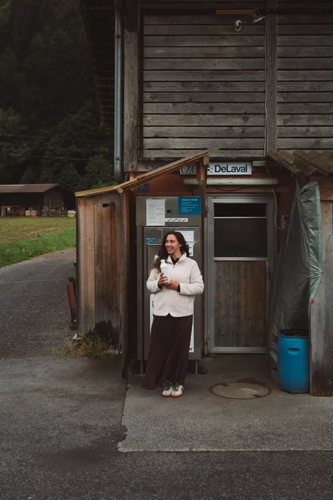 Fresh milk vending machine set up next to a farm in Switzerland